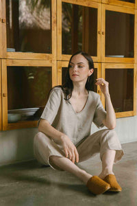 Relaxed fit linen top with a soft V neckline in natural color 