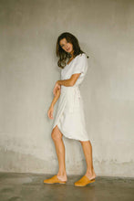 Load image into Gallery viewer, Wrap skirt made from soft rayon linen blend in natural color pair with a white top
