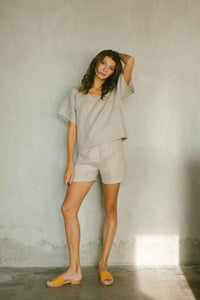 Relaxed fit linen top with a soft V neckline in natural