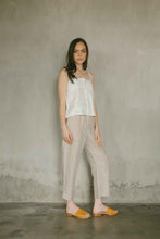 Load image into Gallery viewer, Relaxed fit tank top made from 100% linen in white color with button details
