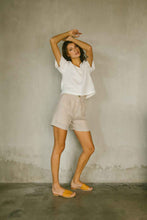 Load image into Gallery viewer, Relaxed fit top with a soft V neckline in white made from 100% Belgian Linen
