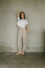 Load image into Gallery viewer, Lightweight button down with a short sleeve in white linen paired with natural linen pants
